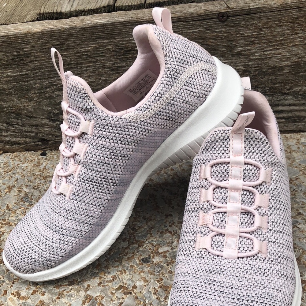 Sketchers memory foam pink shoes.